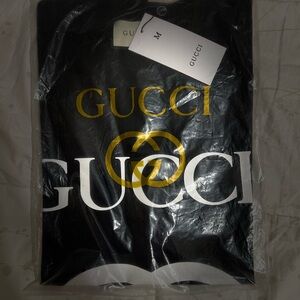 Gucci Black Shirt with Gold and White Logo